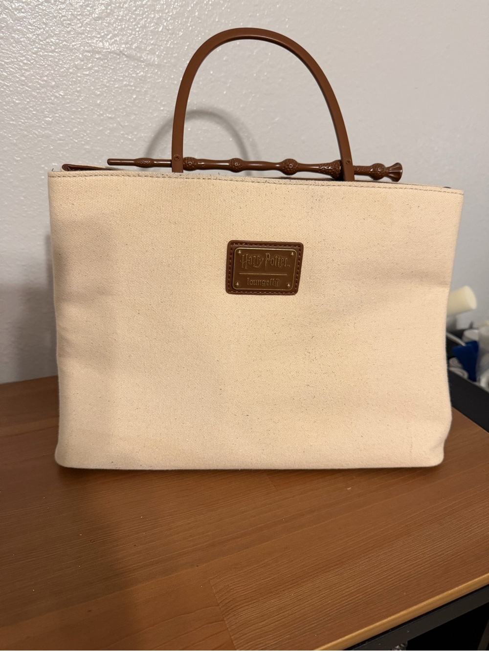 Loungefly Harry Potter Deathly Hallows canvas handbag.